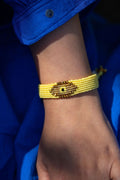 Micro macramé Evil Eye bracelet with golden crystal beads | Butter Yellow