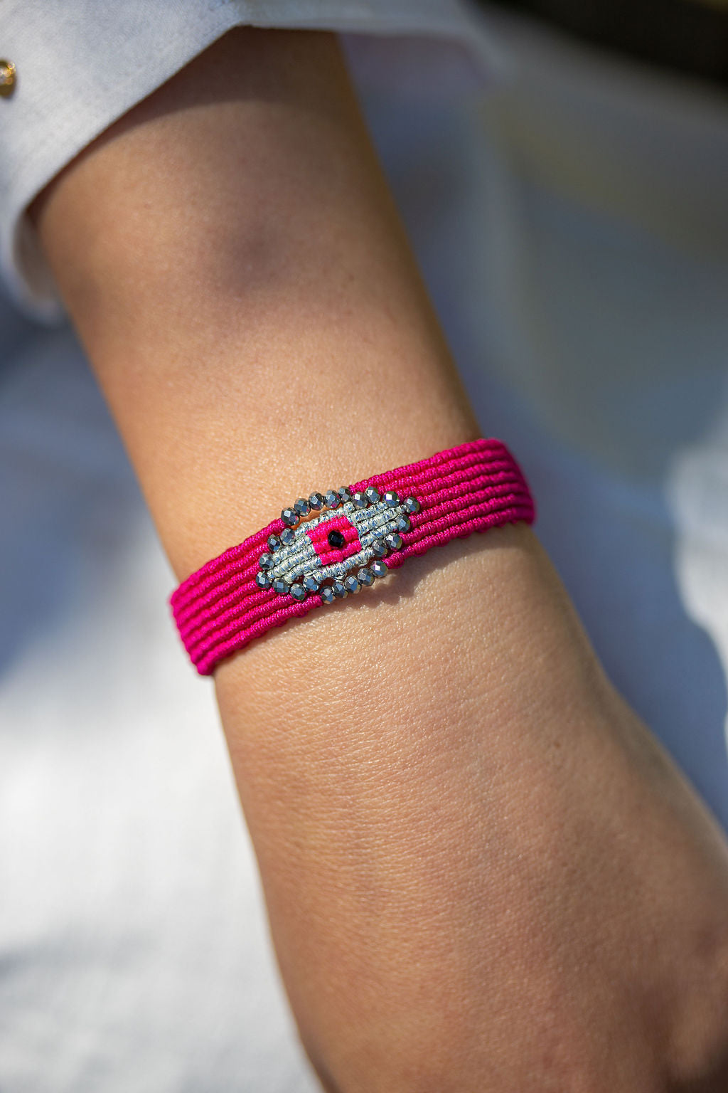 Micro macramé Evil Eye bracelet with silver crystal beads | Hot Pink